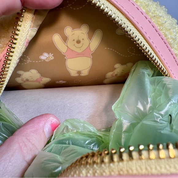 NWT. Disney Parks Loungefly Mini Backpack - Winnie The Pooh pale pastel